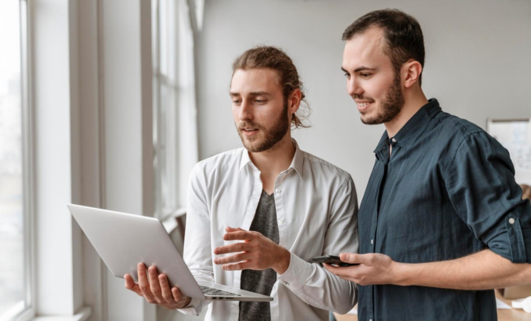 Interactive workshop environment showing participants working together on security exercises and sharing knowledge